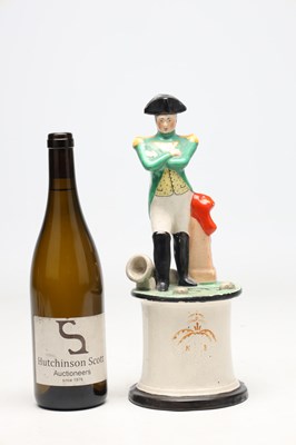 Lot A 19TH CENTURY STAFFORDSHIRE POTTERY FIGURE OF NAPOLEON BONAPARTE