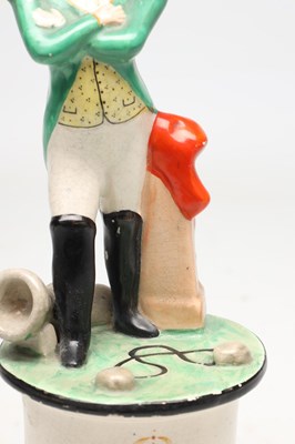 Lot A 19TH CENTURY STAFFORDSHIRE POTTERY FIGURE OF NAPOLEON BONAPARTE