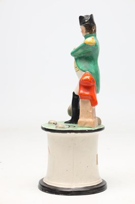Lot A 19TH CENTURY STAFFORDSHIRE POTTERY FIGURE OF NAPOLEON BONAPARTE