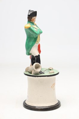 Lot A 19TH CENTURY STAFFORDSHIRE POTTERY FIGURE OF NAPOLEON BONAPARTE