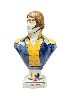 Lot AN EARLY 19TH CENTURY STAFFORDSHIRE PEARLWARE POLYCHROME DECORATED BUST OF NAPOLEON BONAPARTE