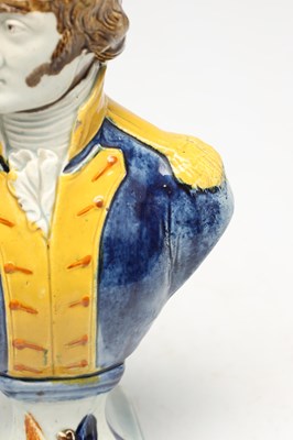 Lot AN EARLY 19TH CENTURY STAFFORDSHIRE PEARLWARE POLYCHROME DECORATED BUST OF NAPOLEON BONAPARTE