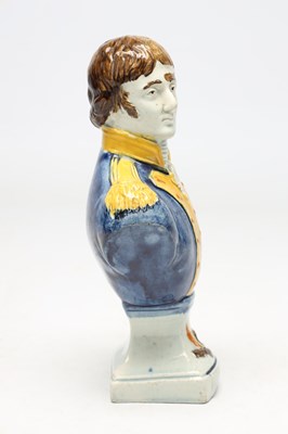 Lot AN EARLY 19TH CENTURY STAFFORDSHIRE PEARLWARE POLYCHROME DECORATED BUST OF NAPOLEON BONAPARTE