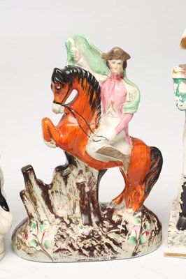 Lot A COLLECTION OF LATE 19TH CENTURY STAFFORDSHIRE POTTERY FIGURES OF NAPOLEON BONAPARTE AND THE DUKE OF WELLINGTON