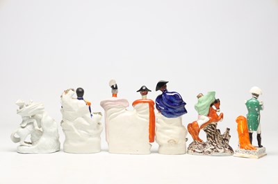Lot A COLLECTION OF LATE 19TH CENTURY STAFFORDSHIRE POTTERY FIGURES OF NAPOLEON BONAPARTE AND THE DUKE OF WELLINGTON