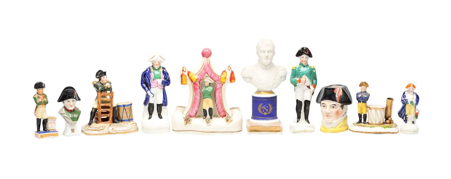 Lot A COLLECTION OF TEN 19TH CENTURY POTTERY FIGURES OF NAPOLEON BONAPARTE