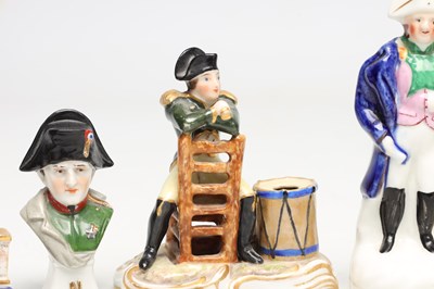 Lot A COLLECTION OF TEN 19TH CENTURY POTTERY FIGURES OF NAPOLEON BONAPARTE