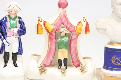 Lot A COLLECTION OF TEN 19TH CENTURY POTTERY FIGURES OF NAPOLEON BONAPARTE