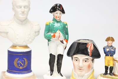 Lot A COLLECTION OF TEN 19TH CENTURY POTTERY FIGURES OF NAPOLEON BONAPARTE