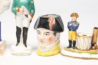 Lot A COLLECTION OF TEN 19TH CENTURY POTTERY FIGURES OF NAPOLEON BONAPARTE