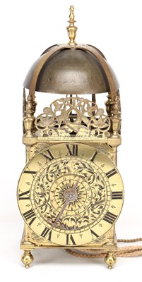 Lot JOHN HARRIS, LONDON. A CHARLES II BRASS STRIKING LANTERN CLOCK WITH BALANCE WHEEL VERGE ESCAPEMENT