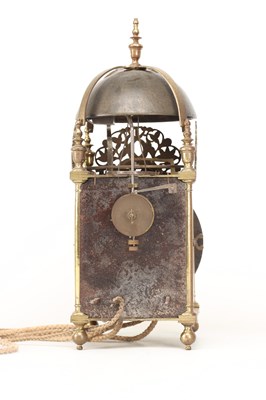 Lot JOHN HARRIS, LONDON. A CHARLES II BRASS STRIKING LANTERN CLOCK WITH BALANCE WHEEL VERGE ESCAPEMENT