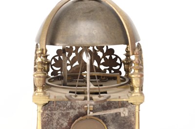 Lot JOHN HARRIS, LONDON. A CHARLES II BRASS STRIKING LANTERN CLOCK WITH BALANCE WHEEL VERGE ESCAPEMENT