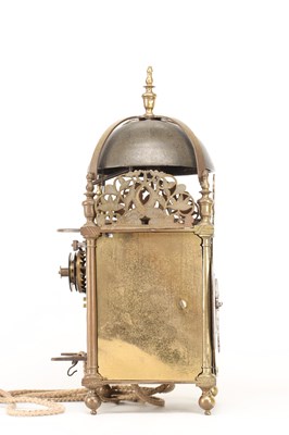Lot JOHN HARRIS, LONDON. A CHARLES II BRASS STRIKING LANTERN CLOCK WITH BALANCE WHEEL VERGE ESCAPEMENT