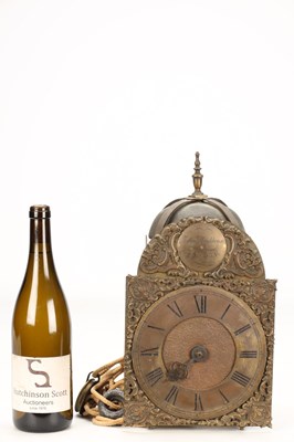 Lot JOHN MONKHOUSE, LONDON. A GEORGE II BRASS VERGE STRIKING LANTERN CLOCK