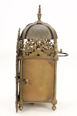 Lot JOHN MONKHOUSE, LONDON. A GEORGE II BRASS VERGE STRIKING LANTERN CLOCK