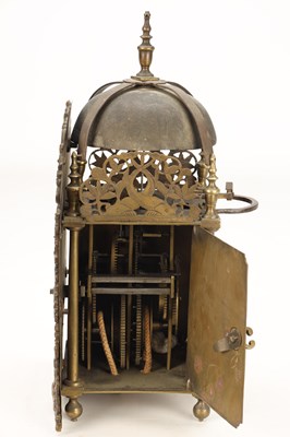 Lot JOHN MONKHOUSE, LONDON. A GEORGE II BRASS VERGE STRIKING LANTERN CLOCK