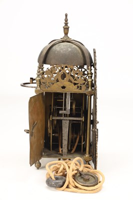Lot JOHN MONKHOUSE, LONDON. A GEORGE II BRASS VERGE STRIKING LANTERN CLOCK