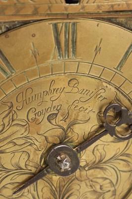 Lot HUMPHREY BANNISTER, CROYDON. A CHARLES II BRASS STRIKING LANTERN CLOCK