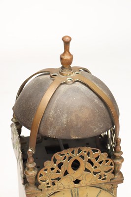 Lot HUMPHREY BANNISTER, CROYDON. A CHARLES II BRASS STRIKING LANTERN CLOCK