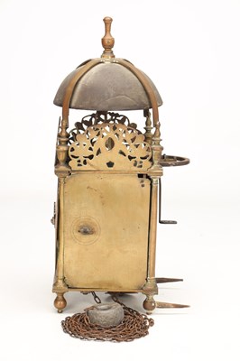 Lot HUMPHREY BANNISTER, CROYDON. A CHARLES II BRASS STRIKING LANTERN CLOCK