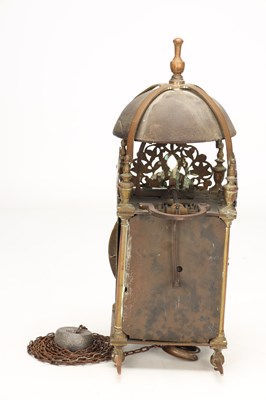 Lot HUMPHREY BANNISTER, CROYDON. A CHARLES II BRASS STRIKING LANTERN CLOCK