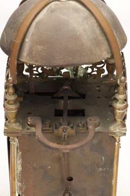 Lot HUMPHREY BANNISTER, CROYDON. A CHARLES II BRASS STRIKING LANTERN CLOCK
