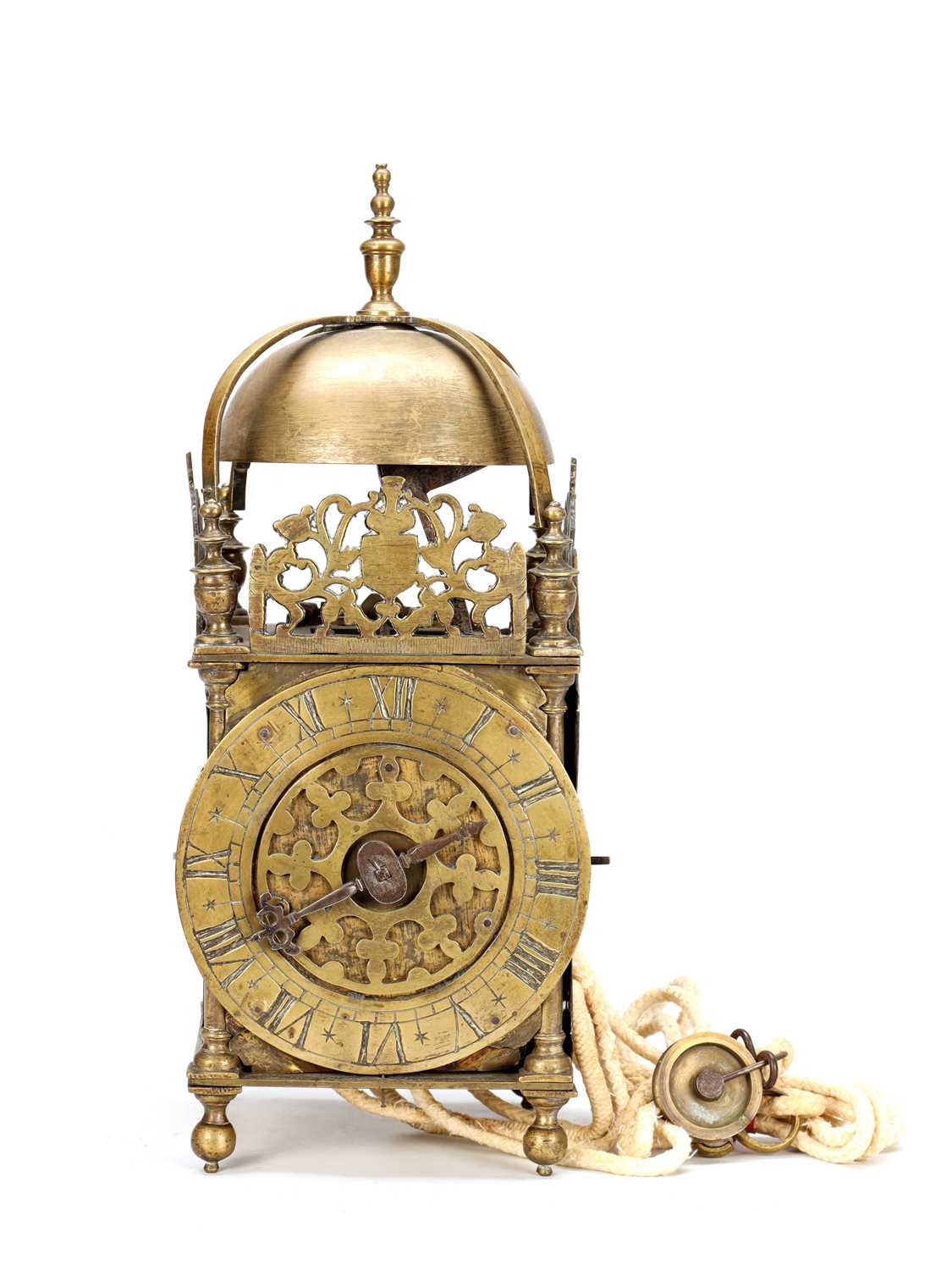 Lot A MID 17TH CENTURY BRASS STRIKING LANTERN CLOCK