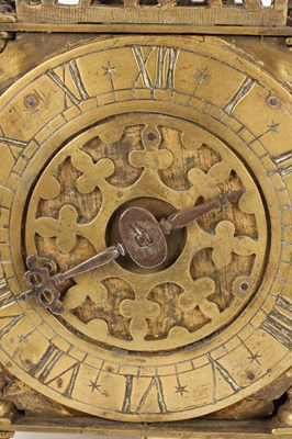 Lot A MID 17TH CENTURY BRASS STRIKING LANTERN CLOCK