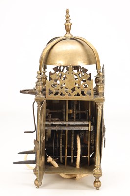 Lot A MID 17TH CENTURY BRASS STRIKING LANTERN CLOCK