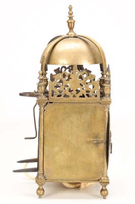 Lot A MID 17TH CENTURY BRASS STRIKING LANTERN CLOCK