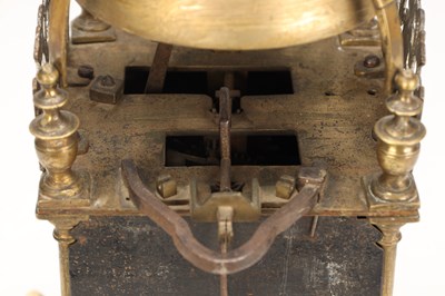 Lot A MID 17TH CENTURY BRASS STRIKING LANTERN CLOCK