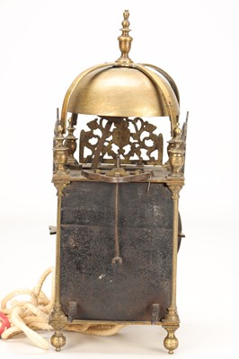 Lot A MID 17TH CENTURY BRASS STRIKING LANTERN CLOCK