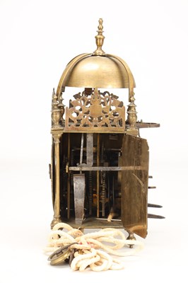Lot A MID 17TH CENTURY BRASS STRIKING LANTERN CLOCK