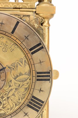 Lot THOMAS KNIGHT, LONDON. A 17TH CENTURY BRASS VERGE STRIKING LANTERN CLOCK WITH ALARM
