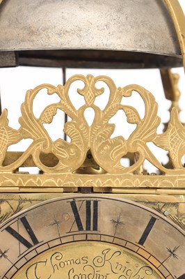 Lot THOMAS KNIGHT, LONDON. A 17TH CENTURY BRASS VERGE STRIKING LANTERN CLOCK WITH ALARM