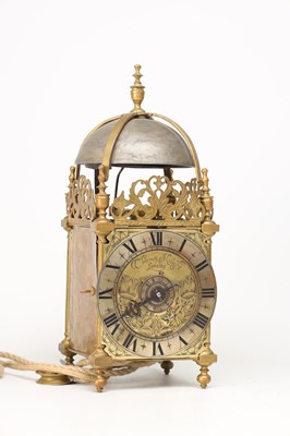 Lot THOMAS KNIGHT, LONDON. A 17TH CENTURY BRASS VERGE STRIKING LANTERN CLOCK WITH ALARM