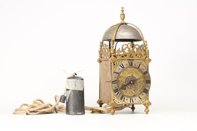 Lot THOMAS KNIGHT, LONDON. A 17TH CENTURY BRASS VERGE STRIKING LANTERN CLOCK WITH ALARM