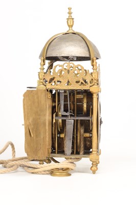Lot THOMAS KNIGHT, LONDON. A 17TH CENTURY BRASS VERGE STRIKING LANTERN CLOCK WITH ALARM