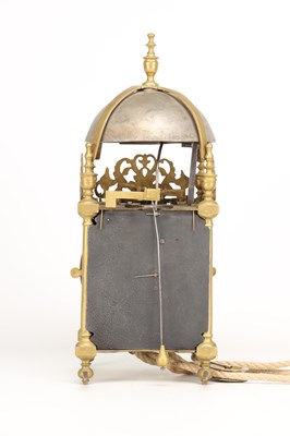 Lot THOMAS KNIGHT, LONDON. A 17TH CENTURY BRASS VERGE STRIKING LANTERN CLOCK WITH ALARM