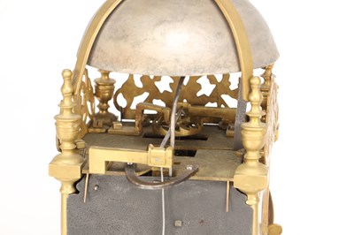 Lot THOMAS KNIGHT, LONDON. A 17TH CENTURY BRASS VERGE STRIKING LANTERN CLOCK WITH ALARM