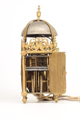 Lot THOMAS KNIGHT, LONDON. A 17TH CENTURY BRASS VERGE STRIKING LANTERN CLOCK WITH ALARM