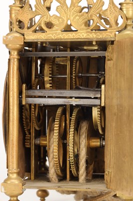 Lot THOMAS KNIGHT, LONDON. A 17TH CENTURY BRASS VERGE STRIKING LANTERN CLOCK WITH ALARM