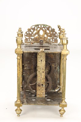 Lot A FIRST PERIOD ENGLISH BRASS LANTERN CLOCK WITH TULIP ENGRAVED DIAL