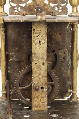 Lot A FIRST PERIOD ENGLISH BRASS LANTERN CLOCK WITH TULIP ENGRAVED DIAL