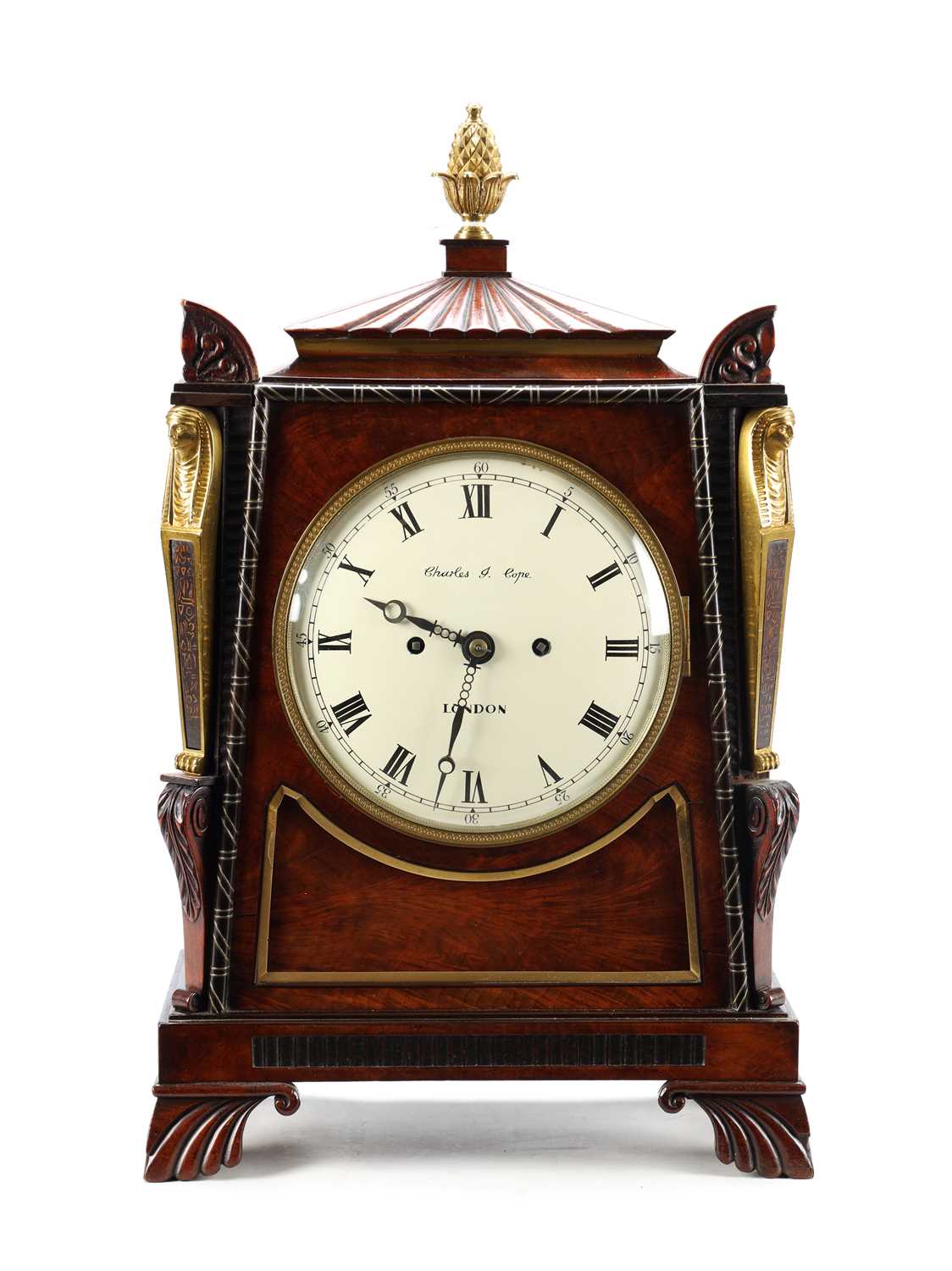 Lot 116 - CHARLES COPE, LONDON A REGENCY FIGURED MAHOGANY EGYPTIAN DOUBLE FUSEE BRACKET CLOCK