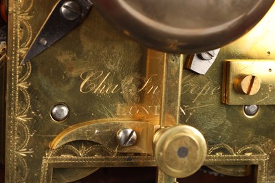 Lot 116 - CHARLES COPE, LONDON A REGENCY FIGURED MAHOGANY EGYPTIAN DOUBLE FUSEE BRACKET CLOCK