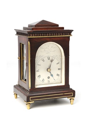 Lot DWERRIHOUSE & CARTER, LONDON. A REGENCY MINIATURE ROSEWOOD AND BRASS INLAID LIBRARY MANTEL CLOCK