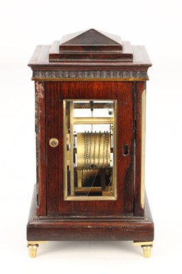 Lot DWERRIHOUSE & CARTER, LONDON. A REGENCY MINIATURE ROSEWOOD AND BRASS INLAID LIBRARY MANTEL CLOCK