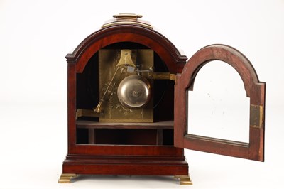Lot JAMES WARREN, CANTERBURY. A GEORGE III FIGURED MAHOGANY PAD TOP VERGE BRACKET CLOCK